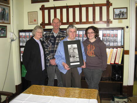 Presentation to Jean Grinton with photo framed.