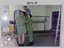 Litho Technicians Dismantling the Consolidation Camera, Army Survey Regiment, Fortuna, Bendigo. 1989.