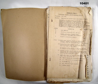 Folder containing pages of training notes related to electrical circuitry.