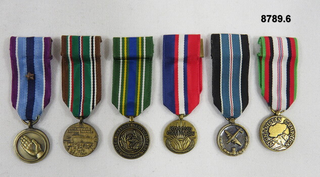 Set of six (6) Miniature medals,