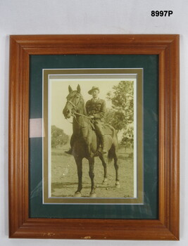 Framed photograph of Swatton on his horse.