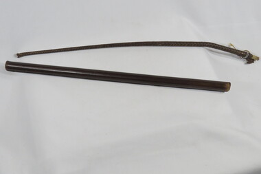 Leather baton and leather riding crop.