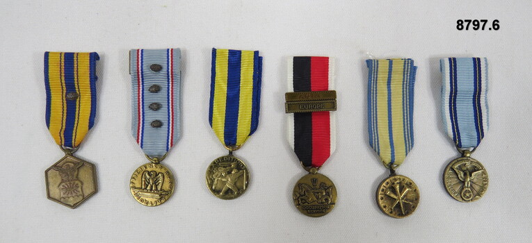 Set of six (6) miniature medals.