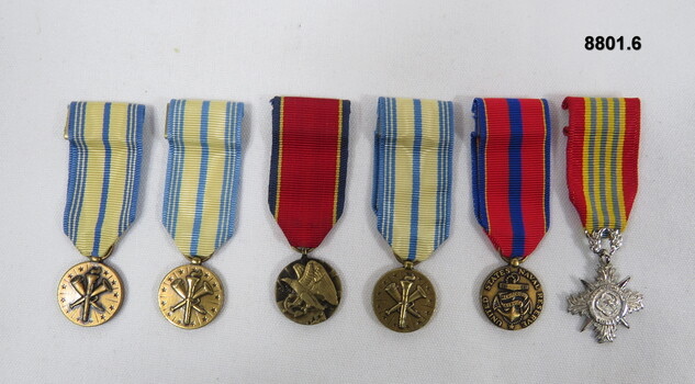 Set of six (6) miniature medals.