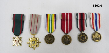 Set of six (6) miniature medals.