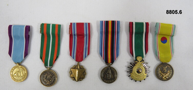 Set of six (6) Miniature medals,