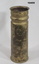 Trench art made from a cannon shell.