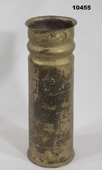 Trench art made from a cannon shell.