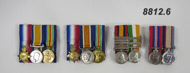 Set of four (4) mounted miniature medals.