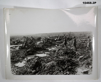 Black and white photographs of Battlefield scenes in WW1.