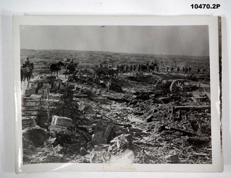 Black and white photographs of cratered Battlefields in WW1.