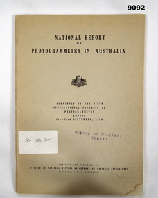 A buff coloured card covered paper report