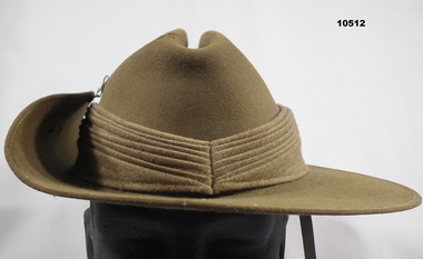 Slouch hat with Pugaree and chin strap.