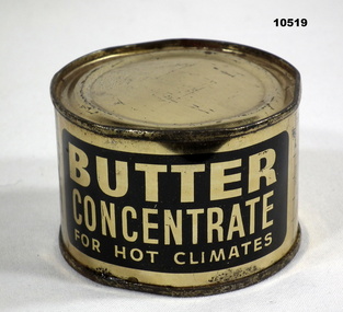 Gold coloured tin of Butter concentrate.