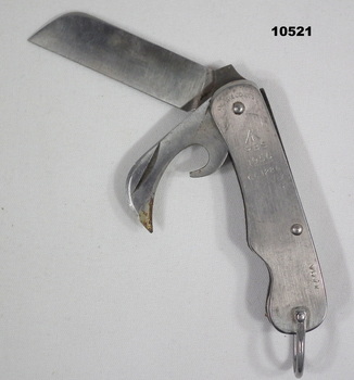 Metal utility knife with two fold out pieces.