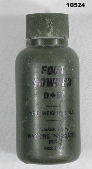 Foot powder bottle, green plastic.