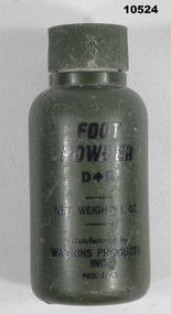 Foot powder bottle, green plastic.