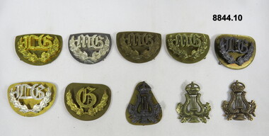 Various Military badges of different styles.