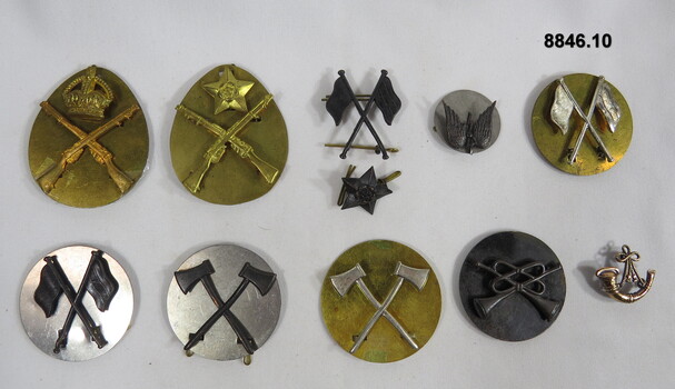 Various Military badges of different styles.