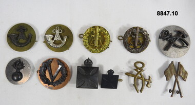 Various Military badges of different styles.
