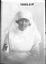 10553.01P Miss A Henry, wearing the uniform of a nursing orderly of the Voluntary Aid Detachment                                               