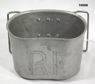 Aluminium mug with fold around handle.
