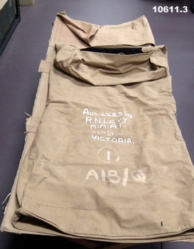 Canvas stretcher with sleep bag.