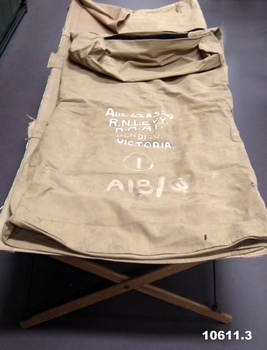 Canvas stretcher with sleep bag.