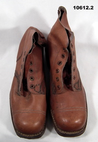 Pair of brown hob nail boots.