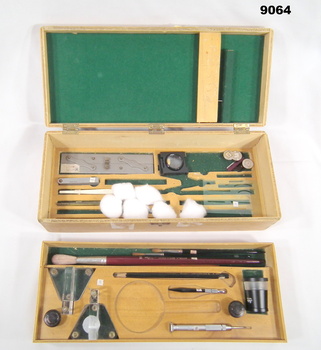 Wooden box containing a full range of cartographic instruments