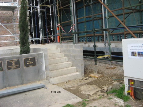 One plaque removed so steps can go in.