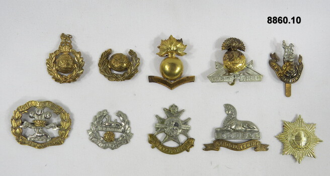 Various military badges of different types.