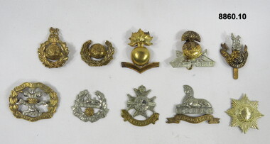 Various military badges of different types.