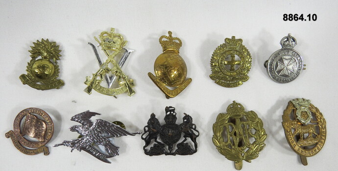 Various military badges of different types.
