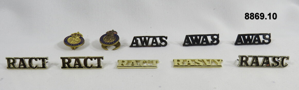 Various military badges of different types.