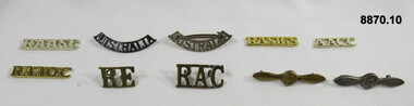 Various military badges of different types.