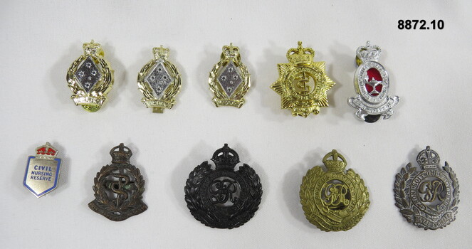 Various military badges of different types.