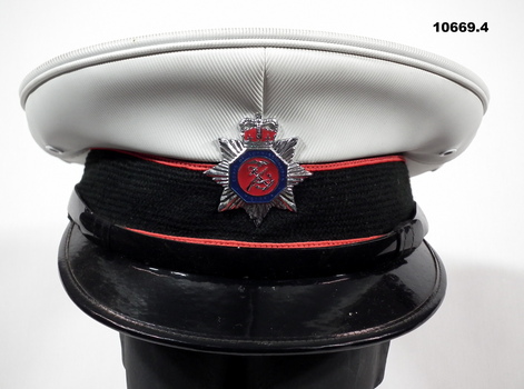Uniform black jacket, trousers, shirt and cap.