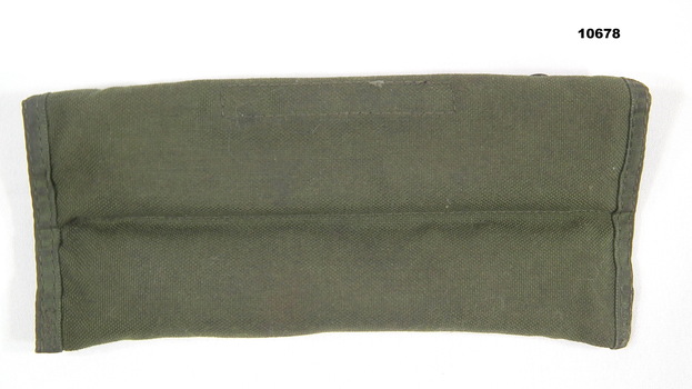 Green canvas weapon cleaning kit.