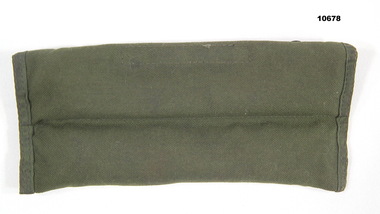 Green canvas weapon cleaning kit.