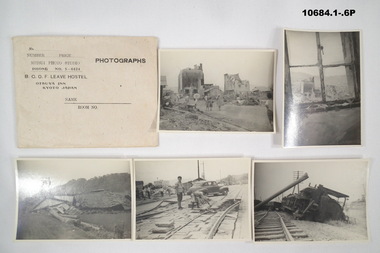 Envelope and eleven (11) photos at Hiroshima 1947-49.