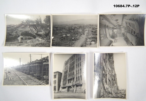 Envelope and eleven (11) photos at Hiroshima 1947-49.