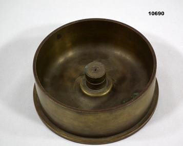 Base, shell case heavy calibre.