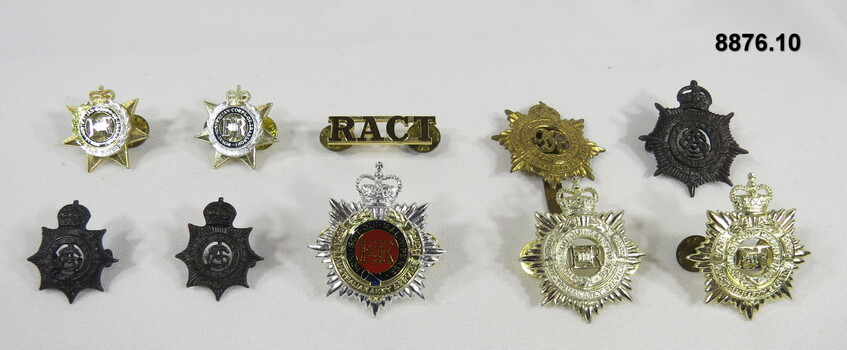 Various military badges of different types.