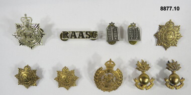 Various military badges of different types.