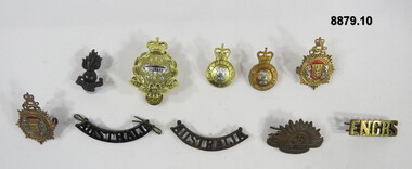 Various military badges of different types.
