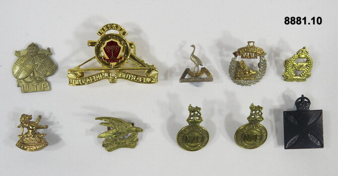 Various military badges of different types.