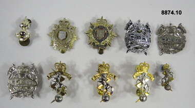 Various military badges of different types.