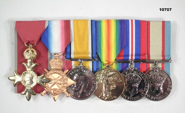 WW1 and WW2 medals with an OBE.