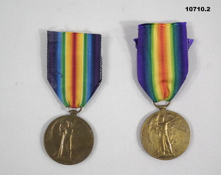Two WW1 medals with ribbons.